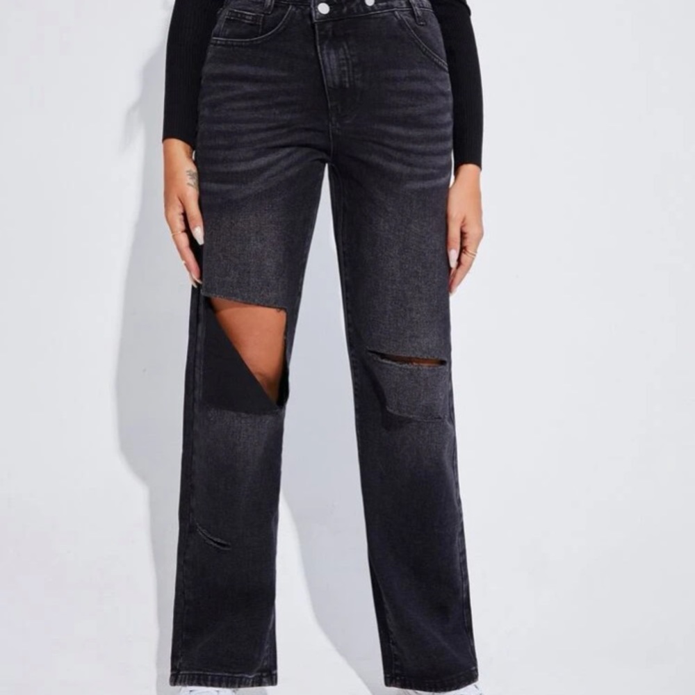 Straight legged ripped jeans